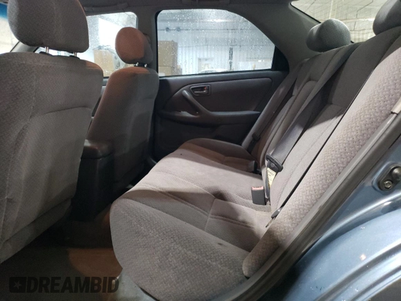 2000 Toyota Camry CE z VIN 4T1BG22K7YU744080, wystawiony jako Copart lot #56675105 z przebiegiem 226 154 mil mil oraz Szkoda całkowita • Salvage title. Historia ofert i sprzedaży dostępna na DreamBid. Obrazek 10.