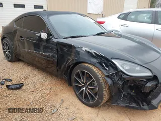 2023 Toyota 86 z VIN JF1ZNBB1XP9760765, wystawiony jako IAAI lot #41754213 z przebiegiem 30 269 mil mil oraz . Historia ofert i sprzedaży dostępna na DreamBid. Obrazek 6.