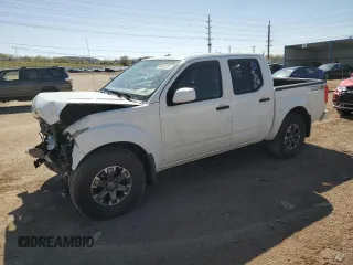 2018 Nissan Frontier Pro-4X with VIN 1N6AD0EV1JN715111, listed as a Copart auction lot 54012255 with 127,409 mi miles and Salvage title. Bid and sale history available at DreamBid. Image 1.
