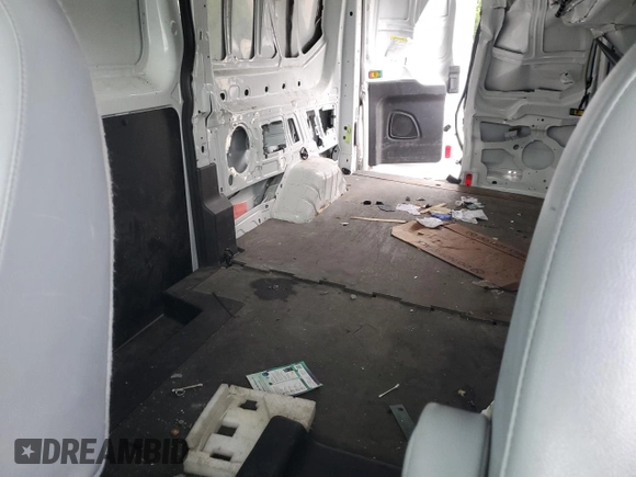 2019 Ford Transit z VIN 1FTYR2CG2KKB82613, wystawiony jako Copart lot #61435345 z przebiegiem 100 090 mil mil oraz Szkoda całkowita • Salvage title. Historia ofert i sprzedaży dostępna na DreamBid. Obrazek 11.
