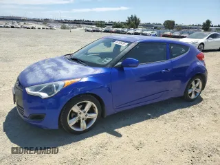 2013 Hyundai Veloster w/Red Int with VIN KMHTC6AD5DU180031, listed as a Copart auction lot 66190435 with 97,586 mi miles and Salvage title. Bid and sale history available at DreamBid. Image 1.