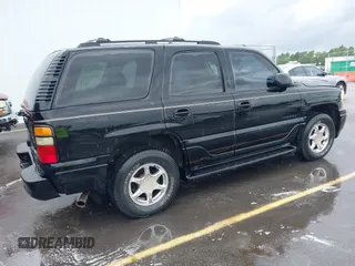 2005 GMC Yukon Denali z VIN 1GKEK63U95J112545, wystawiony jako IAAI lot #42396941 z przebiegiem 288 670 mil mil oraz . Historia ofert i sprzedaży dostępna na DreamBid. Obrazek 4.