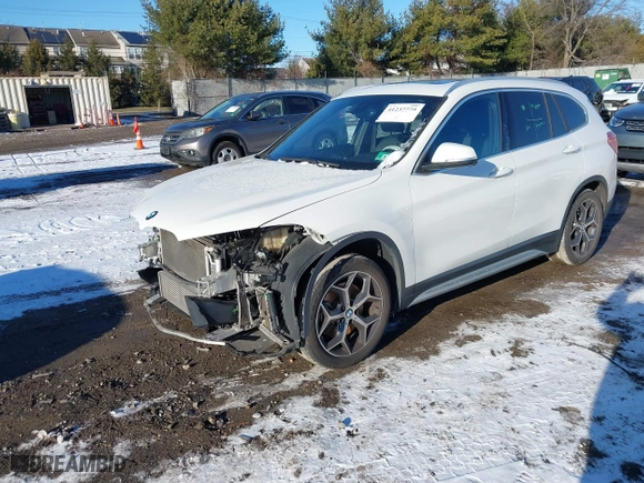 2018 BMW X1 xDrive28i with VIN WBXHT3C36J5L30217, listed as a IAAI auction lot 41237775 with 60,071 mi miles. Bid and sale history available at carsss.com. Image 20.