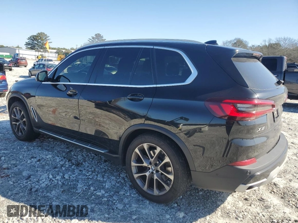 2023 BMW X5 sDrive40i with VIN 5UXCR4C06P9P01409, listed as a Copart auction lot 43127395 with 27,564 mi miles and Salvage Title. Bid and sale history available at carsss.com. Image 2.