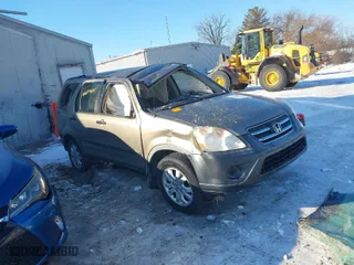 2006 Honda CR-V EX with VIN JHLRD68806C017948, listed as a IAAI auction lot 41258241 with 212,799 mi miles. Bid and sale history available at carsss.com. Image 1.