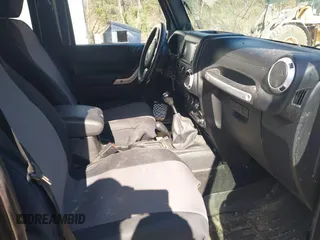 2014 Jeep Wrangler Unlimited Sahara с VIN 1C4BJWEG3EL267279, выставлен на аукционе IAAI как лот 42083836 с пробегом 81 796 миль миль и . История ставок и продаж доступна на DreamBid. Изображение 5.