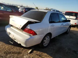 2003 Mitsubishi Lancer LS with VIN JA3AJ36E83U086319, listed as a Copart auction lot 80986464 with 130,043 mi miles and Salvage Title. Bid and sale history available at carsss.com. Image 3.