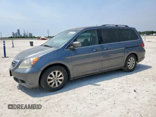 2010 Honda Odyssey EX with VIN 5FNRL3H52AB022018, listed as a Copart auction lot 57323135 with 247,339 mi miles and Salvage title. Bid and sale history available at DreamBid. Image 1.