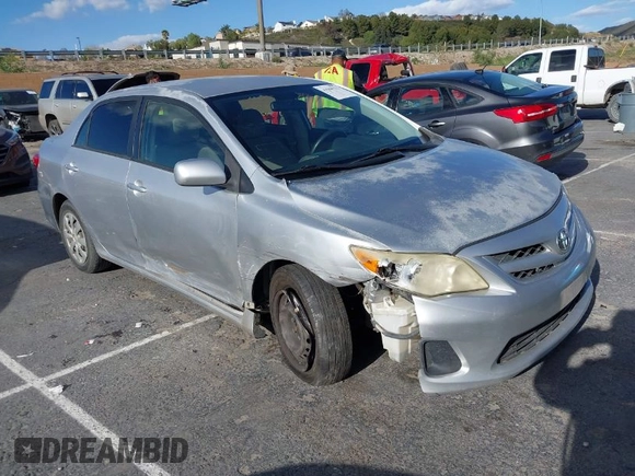 2011 Toyota Corolla L with VIN JTDBU4EE7BJ108265, listed as a IAAI auction lot 41969221 with 104,273 mi miles. Bid and sale history available at carsss.com. Image 1.