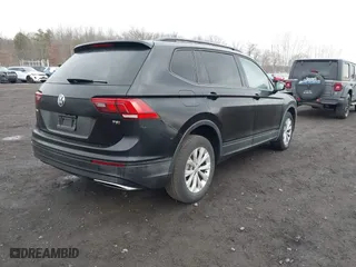 2018 Volkswagen Tiguan S with VIN 3VV1B7AX9JM091210, listed as a IAAI auction lot 41683380 with 63,627 mi miles. Bid and sale history available at carsss.com. Image 4.