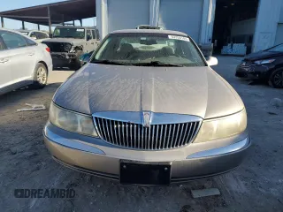 2000 Lincoln Continental with VIN 1LNHM97V4YY832947, listed as a Copart auction lot 83350184 with 164,389 mi miles and Salvage Title. Bid and sale history available at carsss.com. Image 5.
