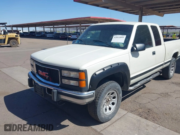 1995 GMC Sierra 1500 z VIN 2GTEK19K9S1591415, wystawiony jako IAAI lot #42011093 z przebiegiem 334 476 mil mil oraz . Historia ofert i sprzedaży dostępna na DreamBid. Obrazek 6.