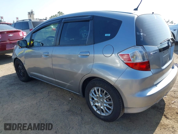 2009 Honda Fit with VIN JHMGE88239S025012, listed as a IAAI auction lot 42584028 with 163,965 mi miles and . Bid and sale history available at DreamBid. Image 3.