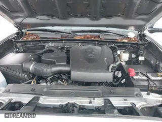 2020 Toyota Tacoma 4WD SR5 with VIN 3TMCZ5AN2LM300117, listed as a IAAI auction lot 41874864 with 59,594 mi miles. Bid and sale history available at carsss.com. Image 10.