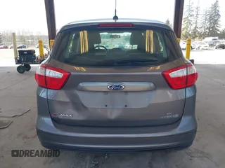 2013 Ford C-Max SE z VIN 1FADP5AU4DL556432, wystawiony jako IAAI lot #41703080 z przebiegiem 147 693 mil mil oraz . Historia ofert i sprzedaży dostępna na DreamBid. Obrazek 16.