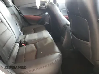 2016 Mazda CX-3 Touring z VIN JM1DKDC71G0127880, wystawiony jako Copart lot #52938385 z przebiegiem 73 860 mil mil oraz Szkody całkowita. Historia ofert i sprzedaży dostępna na DreamBid. Obrazek 10.