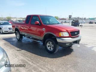 2002 Ford F-150 XL z VIN 1FTRX18L32NA60433, wystawiony jako IAAI lot #41975627 z przebiegiem 215 261 mil mil oraz . Historia ofert i sprzedaży dostępna na DreamBid. Obrazek 1.