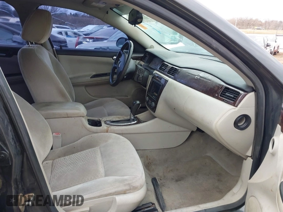 2014 Chevrolet Impala LT with VIN 2G1WB5E35E1123415, listed as a IAAI auction lot 41101111 with 129,870 mi miles and . Bid and sale history available at DreamBid. Image 5.