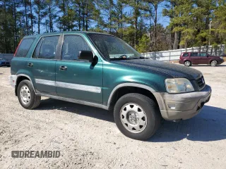 2000 Honda CR-V LX with VIN JHLRD1840YC033134, listed as a Copart auction lot 48556665 with 202,774 mi miles and Salvage Title. Bid and sale history available at carsss.com. Image 4.