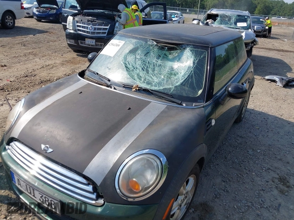 2011 MINI Hardtop with VIN WMWSU3C53BT183060, listed as a IAAI auction lot 42564309 with 160,145 mi miles and . Bid and sale history available at DreamBid. Image 6.