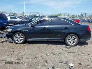 2011 Ford Taurus SEL with VIN 1FAHP2EW6BG127102, listed as a IAAI auction lot 42131123 with 168,965 mi miles. Bid and sale history available at carsss.com. Image 14.