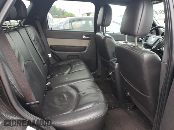 2011 Mercury Mariner Premier z VIN 4M2CN9HG1BKJ00209, wystawiony jako Copart lot #57016475 z przebiegiem 224 019 mil mil oraz Szkoda całkowita • Salvage title. Historia ofert i sprzedaży dostępna na DreamBid. Obrazek 11.