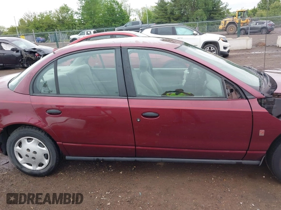 2001 Saturn SL z VIN 1G8ZG52821Z290428, wystawiony jako IAAI lot #42204275 z przebiegiem 171 478 mil mil oraz . Historia ofert i sprzedaży dostępna na DreamBid. Obrazek 13.