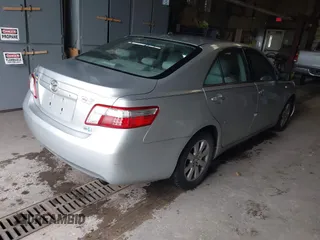 2007 Toyota Camry z VIN JTNBB46K973038138, wystawiony jako IAAI lot #42233680 z przebiegiem 230 480 mil mil oraz . Historia ofert i sprzedaży dostępna na DreamBid. Obrazek 4.