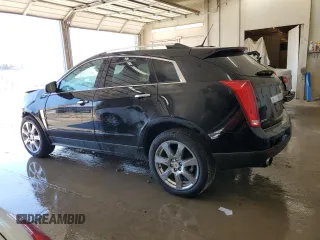 2010 Cadillac SRX Premium Collection with VIN 3GYFNCEY9AS517815, listed as a Copart auction lot 52088385 with 179,262 mi miles and Salvage title. Bid and sale history available at DreamBid. Image 2.