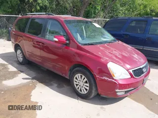 2014 Kia Sedona LX with VIN KNDMG4C71E6564595, listed as a IAAI auction lot 42015687 with 208,270 mi miles. Bid and sale history available at carsss.com. Image 1.