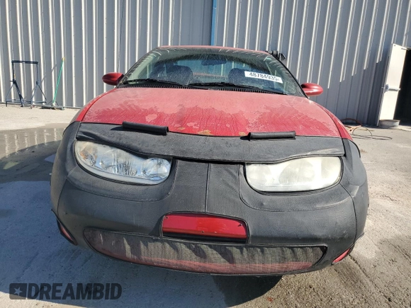 2001 Saturn SC z VIN 1G8ZY12711Z207035, wystawiony jako Copart lot #48784935 z przebiegiem 162 397 mil mil oraz Szkody całkowita. Historia ofert i sprzedaży dostępna na DreamBid. Obrazek 5.