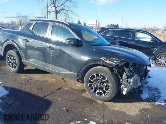 2022 Hyundai Santa Cruz SEL Premium z VIN 5NTJDDAF0NH037208, wystawiony jako IAAI lot #41536366 z przebiegiem 66 096 mil mil oraz . Historia ofert i sprzedaży dostępna na DreamBid. Obrazek 1.