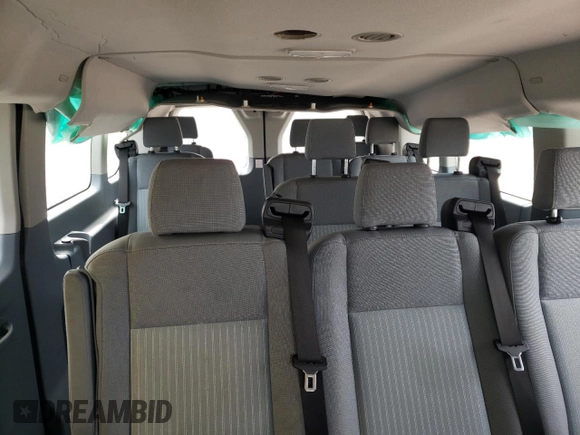 2019 Ford Transit Passenger XL z VIN 1FBZX2ZM4KKB24336, wystawiony jako Copart lot #49377135 z przebiegiem 58 994 mil mil oraz Szkody całkowita. Historia ofert i sprzedaży dostępna na DreamBid. Obrazek 10.