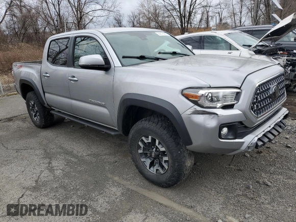 2018 Toyota Tacoma SR z VIN 3TMCZ5AN2JM122416, wystawiony jako Copart lot #61351225 z przebiegiem Nie podano mil oraz Szkoda całkowita • Salvage title. Historia ofert i sprzedaży dostępna na DreamBid. Obrazek 4.