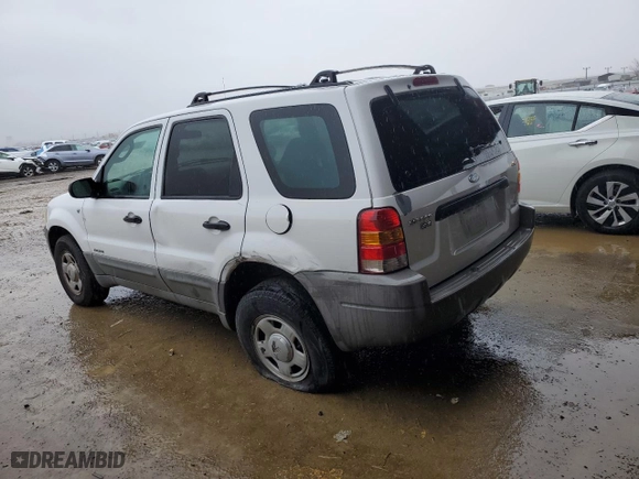 2001 Ford Escape XLS with VIN 1FMYU01191KA29996, listed as a Copart auction lot 86362534 with 265,271 mi miles and Salvage Title. Bid and sale history available at carsss.com. Image 2.