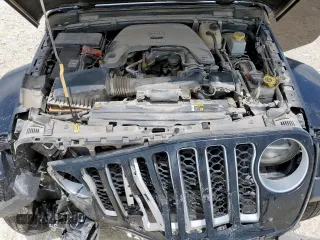 2020 Jeep Gladiator Overland with VIN 1C6HJTFG9LL217966, listed as a Copart auction lot 59424545 with 61,407 mi miles and Salvage title. Bid and sale history available at DreamBid. Image 11.