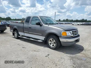2004 Ford F-150 XL with VIN 2FTRX17274CA98376, listed as a Copart auction lot 56300585 with 71,767 mi miles and Salvage title. Bid and sale history available at DreamBid. Image 4.