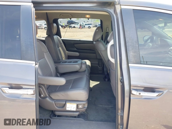 2016 Honda Odyssey SE with VIN 5FNRL5H34GB043343, listed as a IAAI auction lot 42096360 with 140,878 mi miles and . Bid and sale history available at DreamBid. Image 8.