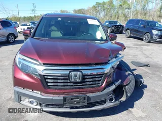2019 Honda Ridgeline RTL-E with VIN 5FPYK3F72KB024461, listed as a IAAI auction lot 41813568 with 122,364 mi miles and . Bid and sale history available at DreamBid. Image 11.
