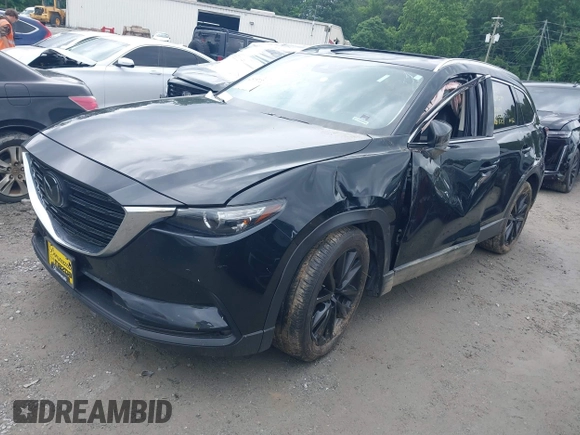 2022 Mazda CX-9 Touring Plus z VIN JM3TCBAY2N0619279, wystawiony jako IAAI lot #42373722 z przebiegiem 43 540 mil mil oraz . Historia ofert i sprzedaży dostępna na DreamBid. Obrazek 2.
