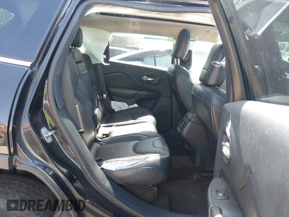 2014 Jeep Cherokee Limited with VIN 1C4PJLDB1EW204545, listed as a IAAI auction lot 42261081 with 260,164 mi miles and . Bid and sale history available at DreamBid. Image 8.