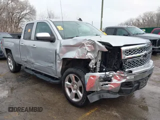 2015 Chevrolet Silverado 1500 LT with VIN 1GCVKREC7FZ413996, listed as a IAAI auction lot 41643571 with 179,598 mi miles. Bid and sale history available at carsss.com. Image 1.