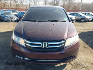 2014 Honda Odyssey EX-L with VIN 5FNRL5H60EB009083, listed as a IAAI auction lot 41633419 with 219,930 mi miles and . Bid and sale history available at carsss.com. Image 12.
