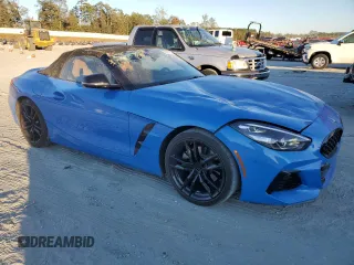 2022 BMW Z4 sDrive30i with VIN WBAHF3C02NWX38818, listed as a Copart auction lot 76604404 with 16,402 mi miles and Salvage Title. Bid and sale history available at carsss.com. Image 4.