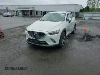 2016 Mazda CX-3 Grand Touring z VIN JM1DKBD77G0105451, wystawiony jako Copart lot #58341495 z przebiegiem 109 525 mil mil oraz Szkody całkowita. Historia ofert i sprzedaży dostępna na DreamBid. Obrazek 13.