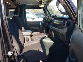 2019 Jeep Wrangler Unlimited Sport S with VIN 1C4HJXDN6KW686480, listed as a IAAI auction lot 41300842 with 67,359 mi miles and . Bid and sale history available at DreamBid. Image 5.