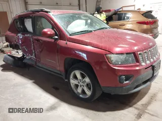 2014 Jeep Compass Latitude with VIN 1C4NJCEB9ED717575, listed as a IAAI auction lot 41532566 with 128,821 mi miles. Bid and sale history available at carsss.com. Image 1.