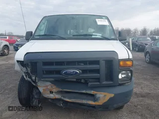 2013 Ford Econoline Cargo Commercial with VIN 1FTNE1EW4DDA09857, listed as a IAAI auction lot 41889302 with 131,059 mi miles and . Bid and sale history available at DreamBid. Image 12.