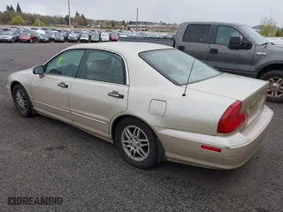 2000 Mitsubishi Diamante LS with VIN 6MMAP67P7YT005234, listed as a IAAI auction lot 41896098 with 131,852 mi miles. Bid and sale history available at carsss.com. Image 3.