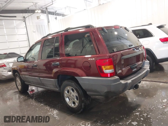2000 Jeep Grand Cherokee Laredo z VIN 1J4GW48N8YC151600, wystawiony jako IAAI lot #42178535 z przebiegiem 71 207 mil mil oraz . Historia ofert i sprzedaży dostępna na DreamBid. Obrazek 14.